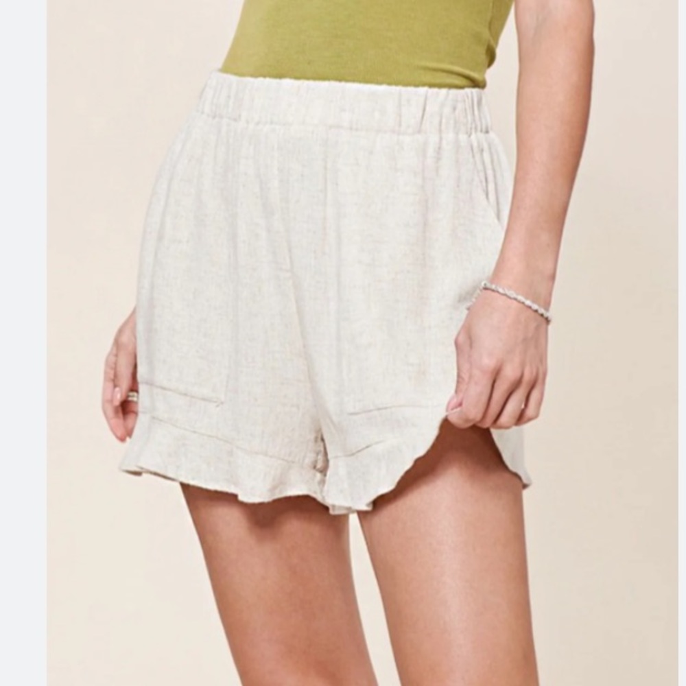 Large linen ivory colored light weight shorts with pockets